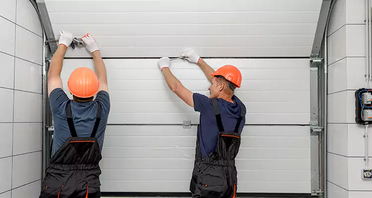 Garage Door Bottom Panel Repair in Royal Palm Beach, FL